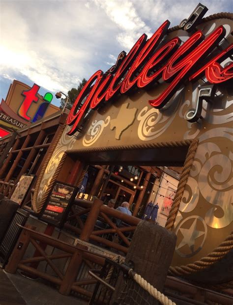 Gilley's bar las vegas - Gilley’s Saloon, Dance Hall & Bar-B-Que is open for lunch and dinner featuring a show kitchen, views of the world-famous Las Vegas Strip, custom saddle seats at the bar, live entertainment, line dancing, mechanical bull riding, and the world-famous Gilley Girls. 